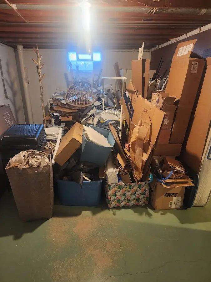 Roll-off dumpster container at job site for 15 Yard Dumpster Rental in Katy